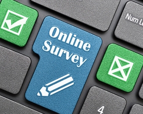 online survey message displayed on keyboard